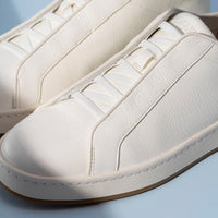 Banks Court Slip-On Stretch-Lace Sneaker in White Leather by Allen Edmonds