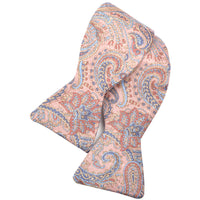 Pink, Denim Blue, and Biscotti Iconic Paisley Silk Printed Panama Bow Tie by Dion Neckwear