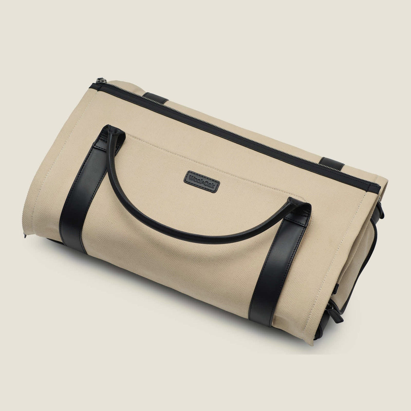 Nova - The Original Garment Roller Duffle in Beige Herringbone Waxed Canvas with Black Leather Trim by Wool & Oak