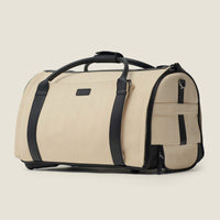 Nova - The Original Garment Roller Duffle in Beige Herringbone Waxed Canvas with Black Leather Trim by Wool & Oak