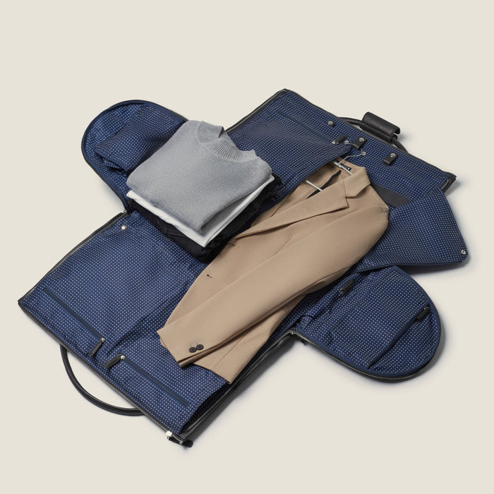 Nova - The Original Garment Roller Duffle in Beige Herringbone Waxed Canvas with Black Leather Trim by Wool & Oak
