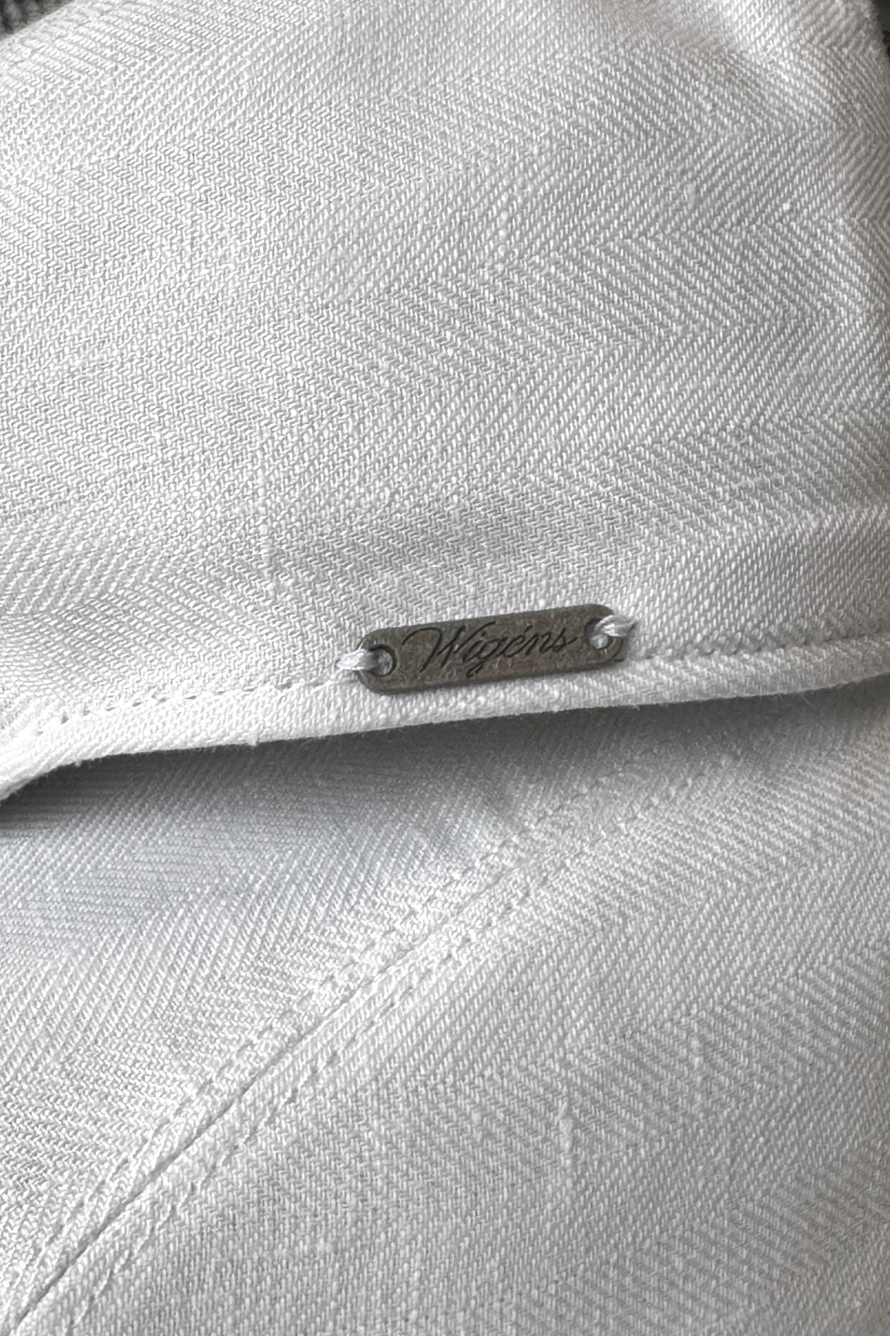 Ivy Modern Subalpino Herringbone Linen Cap in White by Wigens