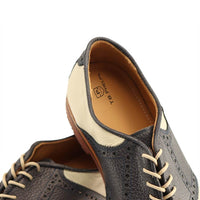 David Oxford Saddle Shoe in Ivory/Navy by T.B. Phelps
